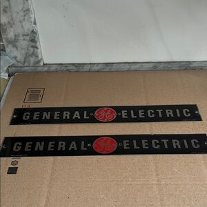 General Electric Black Metal 'ELECTRIC' Sign with Red Emblem General Electric